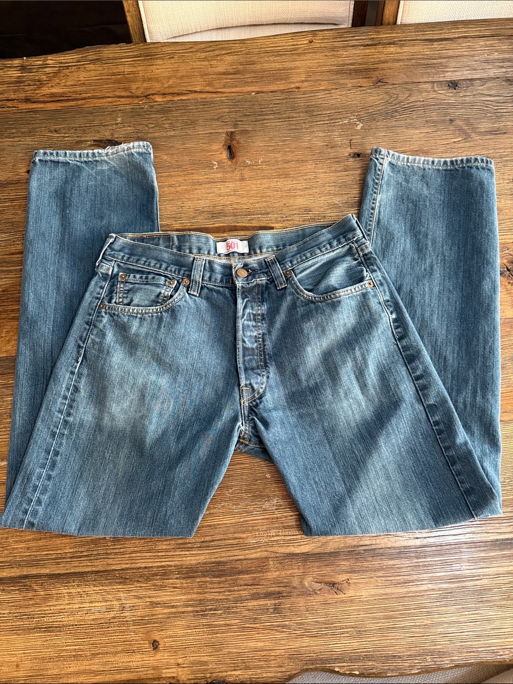 Levi's 501 Men's Straight Jeans in Faded Blue Denim, button up